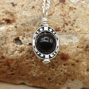Shop Jet Jewelry! Tiny Black Jet pendant necklace. 8mm stone. Crystal Reiki jewelry uk. Minimalist oval frame jewellery. Empowered crystals | Natural genuine Jet jewelry. Buy crystal jewelry, handmade handcrafted artisan jewelry for women.  Unique handmade gift ideas. #jewelry #beadedjewelry #beadedjewelry #gift #shopping #handmadejewelry #fashion #style #product #jewelry #affiliate #ad
