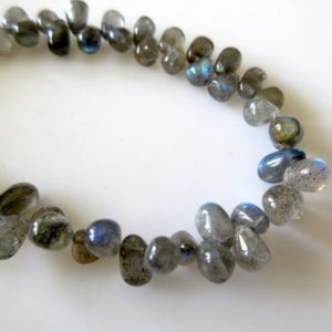 Shop Labradorite Bead Shapes! Natural Smooth Labradorite Tear Drop Briolette Beads, 9 Inches Of Tiny Uniform Sized Calibrated 4x6mm Labradorite Beads, GDS767 | Natural genuine other-shape Labradorite beads for beading and jewelry making.  #jewelry #beads #beadedjewelry #diyjewelry #jewelrymaking #beadstore #beading #affiliate #ad