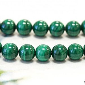 Shop Malachite Round Beads! M/ Malachite 10mm/ 9mm/ 8mm/ 7mm Smooth Round loose beads. 15.5" strand Natural green gemstone beads For jewelry making | Natural genuine round Malachite beads for beading and jewelry making.  #jewelry #beads #beadedjewelry #diyjewelry #jewelrymaking #beadstore #beading #affiliate #ad
