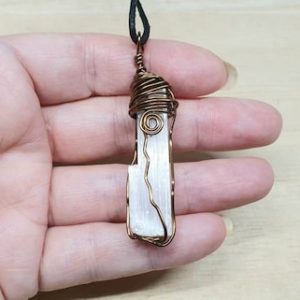 Shop Selenite Necklaces! Mens Raw Selenite pendant. Wire wrapped Selenite necklace.  Raw Crystal necklace. Unisex Reiki jewelry uk | Natural genuine Selenite necklaces. Buy handcrafted artisan men's jewelry, gifts for men.  Unique handmade mens fashion accessories. #jewelry #beadednecklaces #beadedjewelry #shopping #gift #handmadejewelry #necklaces #affiliate #ad