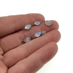 Shop Moonstone Faceted Beads! BULK PACK of Six (6) Gunmetal Sterling silver Pointed/Cut Stone Faceted Oval/Oblong Shaped Moonstone Bezel Connectors – Measuring 5mm x 7mm | Natural genuine faceted Moonstone beads for beading and jewelry making.  #jewelry #beads #beadedjewelry #diyjewelry #jewelrymaking #beadstore #beading #affiliate #ad