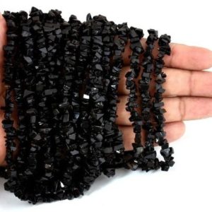 Shop Onyx Chip & Nugget Beads! 34" Strand Natural Black Onyx Uncut Chips Raw Gemstone Beads Natural Semi Precious Gemstone Rough Smooth Raw Nugget Bead,AAA Black Onyx Bead | Natural genuine chip Onyx beads for beading and jewelry making.  #jewelry #beads #beadedjewelry #diyjewelry #jewelrymaking #beadstore #beading #affiliate #ad