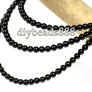Shop Onyx Round Beads! Black Onyx,15 inch full strand natural Black Onyx smooth round beads 2mm 3mm for Choice | Natural genuine round Onyx beads for beading and jewelry making.  #jewelry #beads #beadedjewelry #diyjewelry #jewelrymaking #beadstore #beading #affiliate #ad