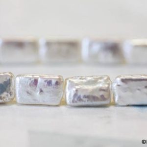 Shop Pearl Bead Shapes! M/ Freshwater Pearl 10x16mm Flat Rectangle beads 16" strand Size varies Warm White color Nice luster pearls For jewelry making | Natural genuine other-shape Pearl beads for beading and jewelry making.  #jewelry #beads #beadedjewelry #diyjewelry #jewelrymaking #beadstore #beading #affiliate #ad