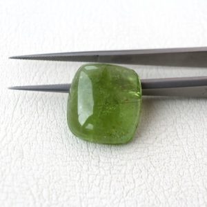Shop Peridot Stones & Crystals! Natural Peridot Cushion Cabochon Loose Gemstone from Pakistan Mines, 15.28ct | Natural genuine stones & crystals in various shapes & sizes. Buy raw cut, tumbled, or polished gemstones for making jewelry or crystal healing energy vibration raising reiki stones. #crystals #gemstones #crystalhealing #crystalsandgemstones #energyhealing #affiliate #ad