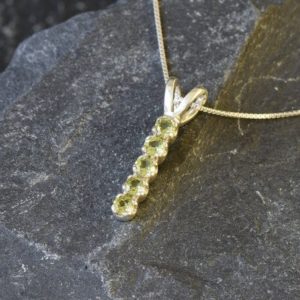 Shop Peridot Pendants! Vertical Peridot Pendant, Natural Peridot Necklace, August Birthstone Necklace, Layering Necklace, Green Stone Necklace, Bands by Adina | Natural genuine Peridot pendants. Buy crystal jewelry, handmade handcrafted artisan jewelry for women.  Unique handmade gift ideas. #jewelry #beadedpendants #beadedjewelry #gift #shopping #handmadejewelry #fashion #style #product #pendants #affiliate #ad