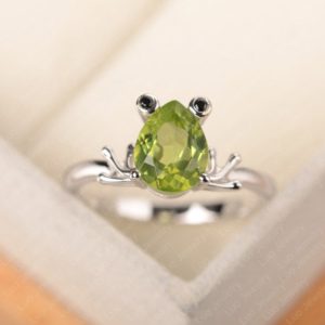 Shop Peridot Jewelry! Frog wedding ring, pear shaped peridot promise ring, August birthstone, gifts for girls | Natural genuine Peridot jewelry. Buy handcrafted artisan wedding jewelry.  Unique handmade bridal jewelry gift ideas. #jewelry #beadedjewelry #gift #crystaljewelry #shopping #handmadejewelry #wedding #bridal #jewelry #affiliate #ad