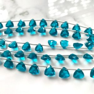 Shop Quartz Crystal Faceted Beads! Gorgeous teal green colored hydro quartz faceted triangles | Natural genuine faceted Quartz beads for beading and jewelry making.  #jewelry #beads #beadedjewelry #diyjewelry #jewelrymaking #beadstore #beading #affiliate #ad