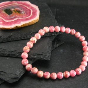 Shop Rhodochrosite Jewelry! Rhodochrosite Genuine Bracelet ~ 7 Inches  ~ 6mm Round Beads | Natural genuine Rhodochrosite jewelry. Buy crystal jewelry, handmade handcrafted artisan jewelry for women.  Unique handmade gift ideas. #jewelry #beadedjewelry #beadedjewelry #gift #shopping #handmadejewelry #fashion #style #product #jewelry #affiliate #ad