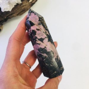Shop Rhodonite Points & Wands! Large Rhodonite Tower, Rhodonite Point, Top Quality Rhodonite | Natural genuine stones & crystals in various shapes & sizes. Buy raw cut, tumbled, or polished gemstones for making jewelry or crystal healing energy vibration raising reiki stones. #crystals #gemstones #crystalhealing #crystalsandgemstones #energyhealing #affiliate #ad