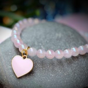 Shop Rose Quartz Bracelets! Aura Rose Quartz 10mm, 8mm or 6mm with Pink Enamel Charm Crystal Bracelet Iridescence Coating | Natural genuine Rose Quartz bracelets. Buy crystal jewelry, handmade handcrafted artisan jewelry for women.  Unique handmade gift ideas. #jewelry #beadedbracelets #beadedjewelry #gift #shopping #handmadejewelry #fashion #style #product #bracelets #affiliate #ad