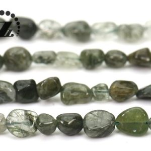Shop Rutilated Quartz Chip & Nugget Beads! Green Rutilated Quartz chips beads,pebble nugget beads,Natural,5-8mm,15" full strand | Natural genuine chip Rutilated Quartz beads for beading and jewelry making.  #jewelry #beads #beadedjewelry #diyjewelry #jewelrymaking #beadstore #beading #affiliate #ad