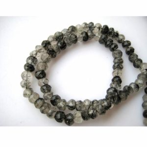 Shop Rutilated Quartz Faceted Beads! Rutilated Quartz Rondelles, Faceted Rondelle Beads, Approx 5mm Round Beads, 13 Inch Strand | Natural genuine faceted Rutilated Quartz beads for beading and jewelry making.  #jewelry #beads #beadedjewelry #diyjewelry #jewelrymaking #beadstore #beading #affiliate #ad