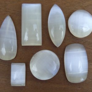 Shop Selenite Cabochons! Selenite Cabochons || Teardrop, Marquise, Square, Round, Various shapes | Natural genuine stones & crystals in various shapes & sizes. Buy raw cut, tumbled, or polished gemstones for making jewelry or crystal healing energy vibration raising reiki stones. #crystals #gemstones #crystalhealing #crystalsandgemstones #energyhealing #affiliate #ad