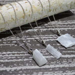 Shop Selenite Necklaces! Selenite Necklace, Raw Selenite Necklace, Chakra Healing Raw Selenite Necklace, Selenite Healing Crystal Necklace | Natural genuine Selenite necklaces. Buy crystal jewelry, handmade handcrafted artisan jewelry for women.  Unique handmade gift ideas. #jewelry #beadednecklaces #beadedjewelry #gift #shopping #handmadejewelry #fashion #style #product #necklaces #affiliate #ad