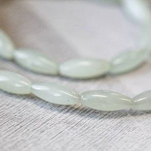 S/ New Jade 5x12mm Oval Rice Beads 16" Strand Natural Light Green Serpentine Smooth Oval Beads For Crafts For All Jewelry Making | Natural genuine other-shape Gemstone beads for beading and jewelry making.  #jewelry #beads #beadedjewelry #diyjewelry #jewelrymaking #beadstore #beading #affiliate #ad