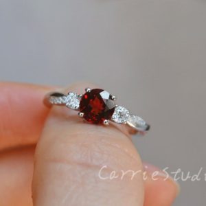 Silver 3 Stone Garnet Ring/Natural Garnet Engagement Ring/ Red Gemstone Ring/Twist Band Ring | Natural genuine Array rings, simple unique alternative gemstone engagement rings. #rings #jewelry #bridal #wedding #jewelryaccessories #engagementrings #weddingideas #affiliate #ad