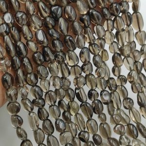 Shop Smoky Quartz Chip & Nugget Beads! Natural Smoky Quartz Smooth Nugget Shape Gemstone Beads,Smoky Quartz Pebble Nugget Beads,Smoky Quartz Plain Tumble Bead For Handmade Jewelry | Natural genuine chip Smoky Quartz beads for beading and jewelry making.  #jewelry #beads #beadedjewelry #diyjewelry #jewelrymaking #beadstore #beading #affiliate #ad