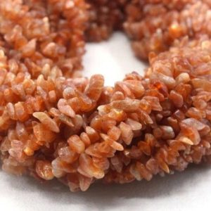 Shop Sunstone Chip & Nugget Beads! 35 " Long Genuine Quality 1 Strand Sunstone Gemstone,Smooth Uncut Chips Beads,Size 5-7 MM Making Sunstone Jewelry, Uncut Beads Wholesale | Natural genuine chip Sunstone beads for beading and jewelry making.  #jewelry #beads #beadedjewelry #diyjewelry #jewelrymaking #beadstore #beading #affiliate #ad