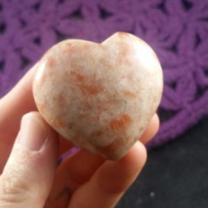 Shop Sunstone Shapes! Sunstone Heart Crystal  Stones Carved Crystals Polished Sparkly Orange carving heart shaped rocks | Natural genuine stones & crystals in various shapes & sizes. Buy raw cut, tumbled, or polished gemstones for making jewelry or crystal healing energy vibration raising reiki stones. #crystals #gemstones #crystalhealing #crystalsandgemstones #energyhealing #affiliate #ad