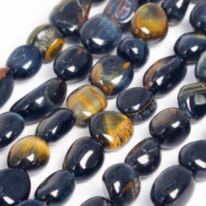 Shop Tiger Eye Chip & Nugget Beads! Genuine Natural Blue Tiger Eye Loose Beads Grade AA Pebble Nugget Shape 6-8mm | Natural genuine chip Tiger Eye beads for beading and jewelry making.  #jewelry #beads #beadedjewelry #diyjewelry #jewelrymaking #beadstore #beading #affiliate #ad