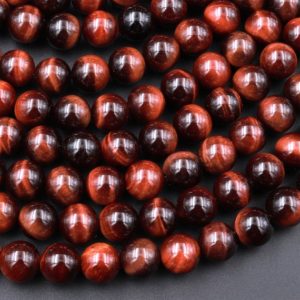 Shop Tiger Eye Beads! AAA Natural Red Tiger's Eye Beads Smooth Round 4mm 6mm 8mm 10mm 15.5" Strand | Natural genuine beads Tiger Eye beads for beading and jewelry making.  #jewelry #beads #beadedjewelry #diyjewelry #jewelrymaking #beadstore #beading #affiliate #ad