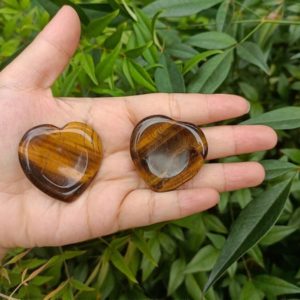 Shop Tiger Eye Shapes! Tiger's Eye Heart Worry Stone | Natural genuine stones & crystals in various shapes & sizes. Buy raw cut, tumbled, or polished gemstones for making jewelry or crystal healing energy vibration raising reiki stones. #crystals #gemstones #crystalhealing #crystalsandgemstones #energyhealing #affiliate #ad