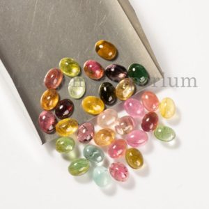 Shop Tourmaline Cabochons! 10 Pc Lot, Tourmaline 6x8mm Oval Loose Gemstone, A Quality Multi Tourmaline Cabochon, Smooth Tourmaline Cabs, Loose Tourmaline Gemstone | Natural genuine stones & crystals in various shapes & sizes. Buy raw cut, tumbled, or polished gemstones for making jewelry or crystal healing energy vibration raising reiki stones. #crystals #gemstones #crystalhealing #crystalsandgemstones #energyhealing #affiliate #ad