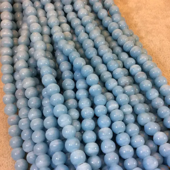 7mm Glossy Turquoise Blue Quality Irregular Rondelle Shape Indian Ceramic Beads - Sold By 16.25" Strand - Approximately 64 Beads