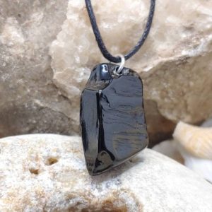 Shop Jet Pendants! Unique handmade Georgian lignite pendant, 100% natural, with natural shape and sterling silver — free worldwide shipping | Natural genuine Jet pendants. Buy crystal jewelry, handmade handcrafted artisan jewelry for women.  Unique handmade gift ideas. #jewelry #beadedpendants #beadedjewelry #gift #shopping #handmadejewelry #fashion #style #product #pendants #affiliate #ad