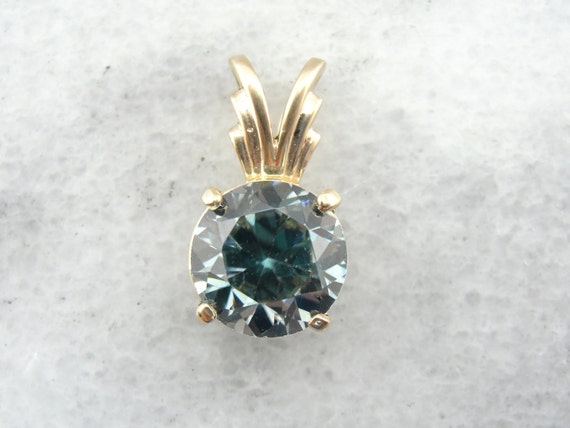 Steely Blue Zircon Gemstone In Radiant Gold Pendant K6daf2