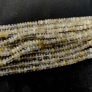 Shop Rutilated Quartz Rondelle Beads! 10" Golden Rutile Quartz Faceted Rondelle Beads AAA Rutilated Quartz Rondelle Beads 7-8mm Rutile Quartz Stone | Natural genuine rondelle Rutilated Quartz beads for beading and jewelry making.  #jewelry #beads #beadedjewelry #diyjewelry #jewelrymaking #beadstore #beading #affiliate #ad