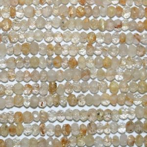 Shop Rutilated Quartz Rondelle Beads! 13" St Rutilated Quartz Faceted Rondelle Beads 3x2mm.-Strand 34cm | Natural genuine rondelle Rutilated Quartz beads for beading and jewelry making.  #jewelry #beads #beadedjewelry #diyjewelry #jewelrymaking #beadstore #beading #affiliate #ad