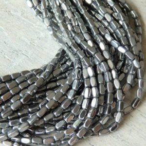Shop Hematite Bead Shapes! 2x4mm Silver hematite beads, rounded rectangle, electroplated, spacer beads, 15.5" strand. Available in other colours! | Natural genuine other-shape Hematite beads for beading and jewelry making.  #jewelry #beads #beadedjewelry #diyjewelry #jewelrymaking #beadstore #beading #affiliate #ad