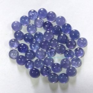 Shop Tanzanite Stones & Crystals! 4 MM Top Quality Natural Tanzanite Round Loose Cabochons – 100% Natural Cabochons | Natural genuine stones & crystals in various shapes & sizes. Buy raw cut, tumbled, or polished gemstones for making jewelry or crystal healing energy vibration raising reiki stones. #crystals #gemstones #crystalhealing #crystalsandgemstones #energyhealing #affiliate #ad