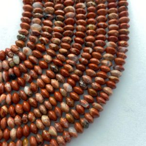 Shop Red Jasper Rondelle Beads! 6mm Red Bend Jasper rondelle gemstone beads. 15" strands of Red Jasper with dabs of pink and white. | Natural genuine rondelle Red Jasper beads for beading and jewelry making.  #jewelry #beads #beadedjewelry #diyjewelry #jewelrymaking #beadstore #beading #affiliate #ad