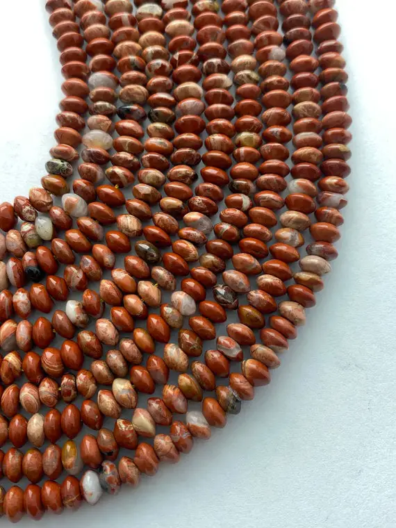 6mm Red Bend Jasper Rondelle Gemstone Beads. 15" Strands Of Red Jasper With Dabs Of Pink And White.