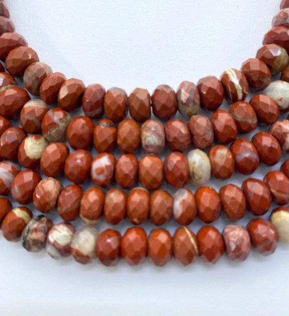 8mm Red Bend Jasper Faceted Rondelle Gemstone Beads. 15" Strands Of Red Jasper With Dabs Of Pink And White.
