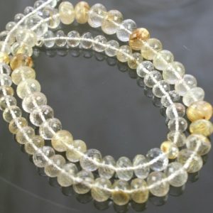 Shop Rutilated Quartz Rondelle Beads! AA Gold Rutilated Quartz Micro Faceted Rondelle Beads 6mm – 10mm | Natural genuine rondelle Rutilated Quartz beads for beading and jewelry making.  #jewelry #beads #beadedjewelry #diyjewelry #jewelrymaking #beadstore #beading #affiliate #ad