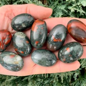 Shop Tumbled Bloodstone Crystals & Pocket Stones! African Bloodstone Tumbled Stone | Natural genuine stones & crystals in various shapes & sizes. Buy raw cut, tumbled, or polished gemstones for making jewelry or crystal healing energy vibration raising reiki stones. #crystals #gemstones #crystalhealing #crystalsandgemstones #energyhealing #affiliate #ad