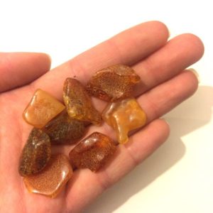 Shop Amber Stones & Crystals! Amber Tumble stone fossilised tree resin | Natural genuine stones & crystals in various shapes & sizes. Buy raw cut, tumbled, or polished gemstones for making jewelry or crystal healing energy vibration raising reiki stones. #crystals #gemstones #crystalhealing #crystalsandgemstones #energyhealing #affiliate #ad