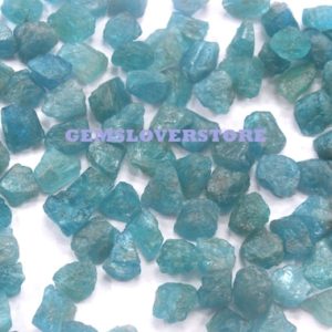 Shop Raw & Rough Apatite Stones! Handcrafted Raw Size 10-12 MM Blue Apatite Is Great For Developing Self-Confidence 25 Pieces Raw Natural Neon Blue Apatite Gemstone Rough | Natural genuine stones & crystals in various shapes & sizes. Buy raw cut, tumbled, or polished gemstones for making jewelry or crystal healing energy vibration raising reiki stones. #crystals #gemstones #crystalhealing #crystalsandgemstones #energyhealing #affiliate #ad