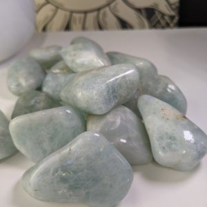 Shop Tumbled Aquamarine Crystals & Pocket Stones! Aquamarine Tumbled Stone Large Ethically Sourced Crystals from Brazil Not Heat-treated  No dyes | Natural genuine stones & crystals in various shapes & sizes. Buy raw cut, tumbled, or polished gemstones for making jewelry or crystal healing energy vibration raising reiki stones. #crystals #gemstones #crystalhealing #crystalsandgemstones #energyhealing #affiliate #ad