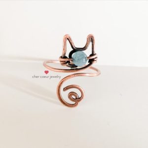 Blue angelite cat ring, handmade wire wrapped copper jewelry, animal inspired healing crystal gemstone ring | Natural genuine Gemstone rings, simple unique handcrafted gemstone rings. #rings #jewelry #shopping #gift #handmade #fashion #style #affiliate #ad