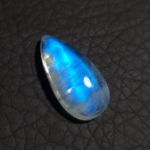 Shop Rainbow Moonstone Cabochons! Blue Moonstone Cabochon 27×13MM. Teardrop Shape. Natural Rainbow Moonstone Loose Cabochon (NW) | Natural genuine stones & crystals in various shapes & sizes. Buy raw cut, tumbled, or polished gemstones for making jewelry or crystal healing energy vibration raising reiki stones. #crystals #gemstones #crystalhealing #crystalsandgemstones #energyhealing #affiliate #ad