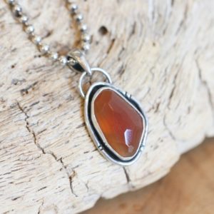 Shop Carnelian Jewelry! Heartland Pendant- Carnelian Pendant – Faceted Carnelian Necklace – Silversmith Pendant | Natural genuine Carnelian jewelry. Buy crystal jewelry, handmade handcrafted artisan jewelry for women.  Unique handmade gift ideas. #jewelry #beadedjewelry #beadedjewelry #gift #shopping #handmadejewelry #fashion #style #product #jewelry #affiliate #ad
