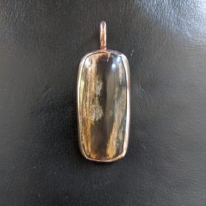 Shop Petrified Wood Pendants! Copper petrified wood pendant | Natural genuine Petrified Wood pendants. Buy crystal jewelry, handmade handcrafted artisan jewelry for women.  Unique handmade gift ideas. #jewelry #beadedpendants #beadedjewelry #gift #shopping #handmadejewelry #fashion #style #product #pendants #affiliate #ad