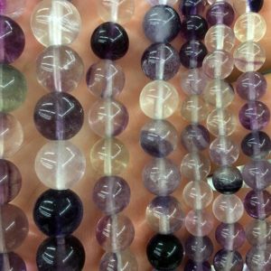 Shop Fluorite Round Beads! Purple Fluorite Beads, Natural Gemstone Beads, Round Stone Beads 6mm 8mm 10mm 12mm 15'' | Natural genuine round Fluorite beads for beading and jewelry making.  #jewelry #beads #beadedjewelry #diyjewelry #jewelrymaking #beadstore #beading #affiliate #ad