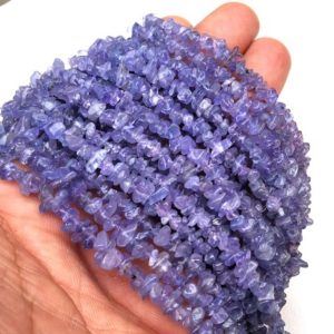 Shop Tanzanite Chip & Nugget Beads! Genuine Quality 16 Inch Long Natural Tanzanite Gemstone,Blue Tanzanite Chips,Smooth Uncut Chips Beads,Size 4-5 MM Tanzanite Gemstone | Natural genuine chip Tanzanite beads for beading and jewelry making.  #jewelry #beads #beadedjewelry #diyjewelry #jewelrymaking #beadstore #beading #affiliate #ad