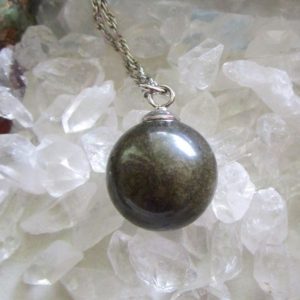 Shop Golden Obsidian Necklaces! Golden Sheen Black Obsidian Natural Crystal Ball Pendant Necklace | Natural genuine Golden Obsidian necklaces. Buy crystal jewelry, handmade handcrafted artisan jewelry for women.  Unique handmade gift ideas. #jewelry #beadednecklaces #beadedjewelry #gift #shopping #handmadejewelry #fashion #style #product #necklaces #affiliate #ad